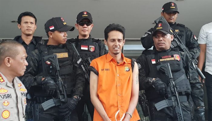 Tersangka kasus pencabulan, Husein Alatas alias HA alias HH, di Polda Metro Jaya, Jakarta Selatan, Jumat (20/12/2019).(firda)