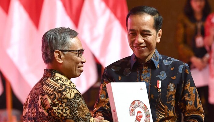 Teks Foto : Presiden Jokowi saat menghadiri acara Tim Percepatan Akses Keuangan Daerah (TPAKD) oleh Otoritas Jasa Keuangan (OJK). (ist)